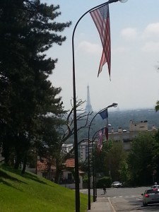 American and French flags fly together
